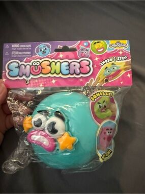 Smushers Teal Squeeze Face Toy by Orb Curiosities